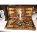 An inlaid wood backgammon board,