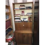 A drinks cabinet / book case wall unit