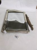 A silver framed mirror (complete but a/f).