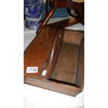 A 19th century lidded oak cutlery tray.