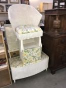 A white painted Lloyd loom set consisting of a chair,