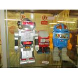 3 battery operated robots, 2 by Horikawa and 1 made in Hong Kong.