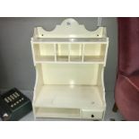 A white painted vintage kitchen wall unit