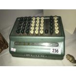 A vintage bell punch company & an adding machine