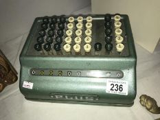 A vintage bell punch company & an adding machine