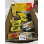 18 play worn Dinky and Corgi model vehicles and accessories including boxed examples.