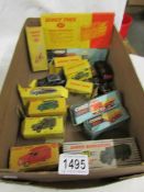18 play worn Dinky and Corgi model vehicles and accessories including boxed examples.