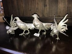 A pair of silver plated pheasants and a pair of silver plated 'Cock fighters'
