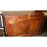 An old French cherry wood sideboard.