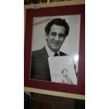 A signed photograph with notes and opening music by Spanish opera singer and conductor Placido