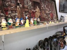 2 sets of Snow White & the Seven Dwarfs figures (squeeze toys with Snow White being a money box & a