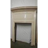 A cast iron fire surround.