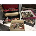 A jewellery box and 3 other boxes of assorted costume jewellery.