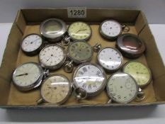 A tray of old pocket watches for spare or repair.