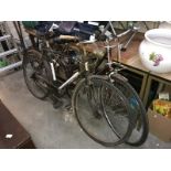 A men's Hopper Tahiti bike and a ladies Raleigh bike