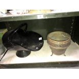A metal coal bucket and a metal urn