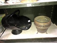 A metal coal bucket and a metal urn