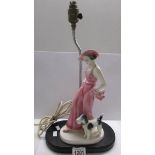 An Art Deco style lady figural table lamp.