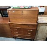 A modern teak bureau