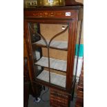 An Edwardian inlaid display cabinet.