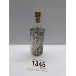 An original glass scent bottle in a silver case, Birmingham 1905/06.
