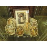 6 oval ivorex character plaques and 2 framed plaques 'Unloading the Boats' and 'Irish Jaunting car'.