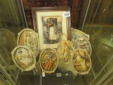 6 oval ivorex character plaques and 2 framed plaques 'Unloading the Boats' and 'Irish Jaunting car'.