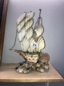 A sailing ship made from sea shells