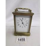 A French brass carriage clock, spring a/f.