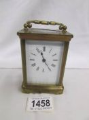 A French brass carriage clock, spring a/f.