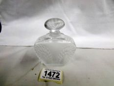 A Lalique glass perfume/scent bottle, etched to base.