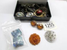A small mixed lot of jewellery including chains, earrings, brooch etc.