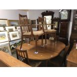 A G plan dining table, 2 carvers and 4 dining chairs.