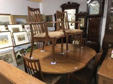 A G plan dining table, 2 carvers and 4 dining chairs.