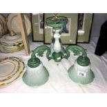 A collection of glass lamp shades including antique etched shade along with funnels and 3 branch