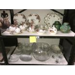 2 shelves of various china and glassware including a 35 piece tea set,
