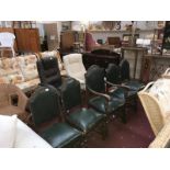 4 green leather upholstered dining chairs & a green leather carver armchair