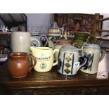 A small collection of stoneware jugs & steins