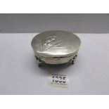 A silver trinket box, hall mark indistinct, approximately 5 ounces.
