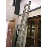 An aluminium double extending ladder