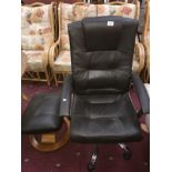 A brown leather effect executive armchair & footstool