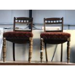 A pair of dining chairs with deep upholstered seats