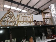 A small collection of wicker ware including wine racks, magazine rack, letter rack etc.