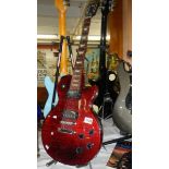 A Gibson Les Paul studio model electric guitar.