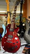 A Gibson Les Paul studio model electric guitar.