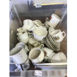 A large quantity of crestedware including various cups and saucers sets