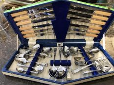 A part boxed cutlery set with additional pieces and a small silver salt spoon