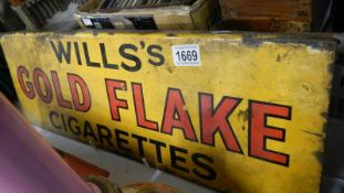 A double sides Will's Gold Flake cigarettes sign.