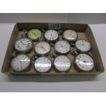 A tray of old pocket watches for spare or repair.