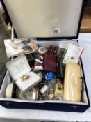 A box of assorted items including watches, badges, costume jewellery etc.